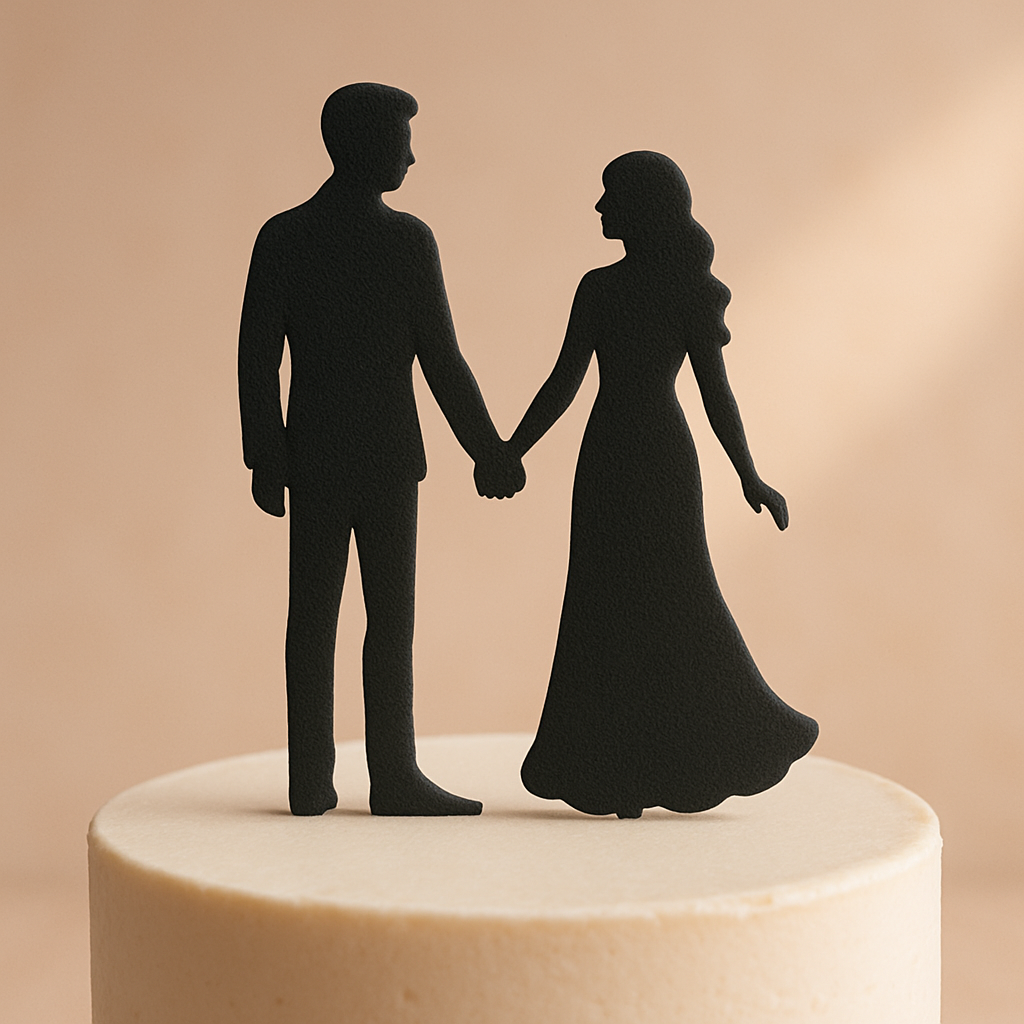A silhouette cake topper of a couple holding hands placed on a simple round cake.